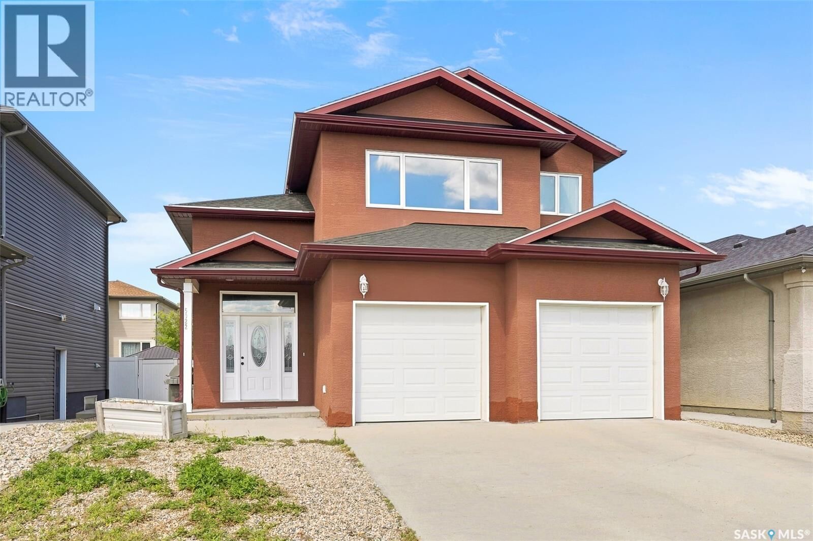 Property Photo:  5022 Tutor Way  SK S4W 0G4 