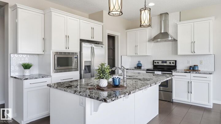Property Photo: 1832 56 Street SW AB T6X 1T6