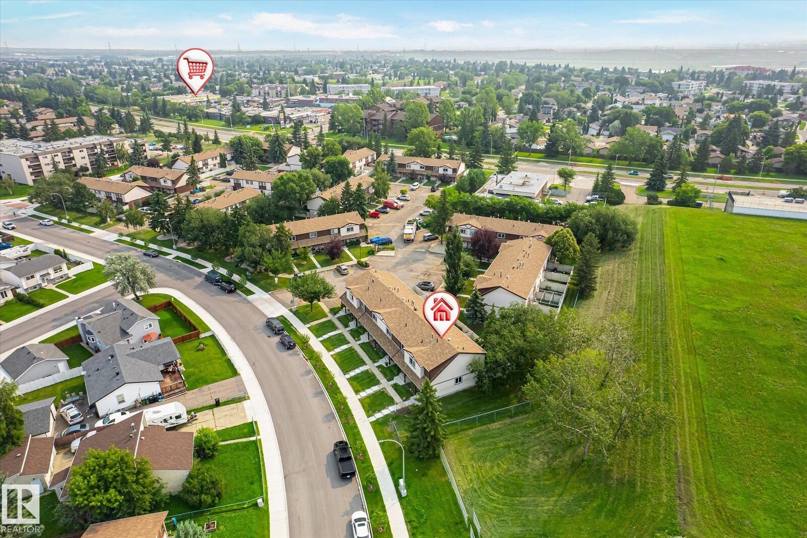 Property Photo: 13833 30 Street NW 2 AB T5Y 2B2