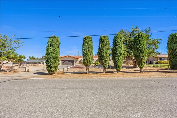 Property Photo:  9419 Guava  CA 92345 