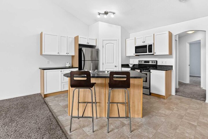 Property Photo: 70 Panatella Landing NW 203 AB T3K 0K2