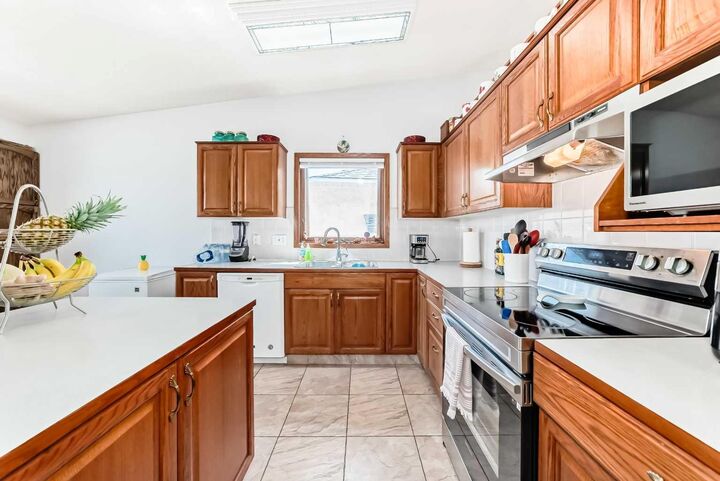 Property Photo: 68 Harvest Oak Way NE AB T3K 3Y2
