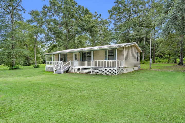 Property Photo:  12556 Woodland Dr.  AL 36535 