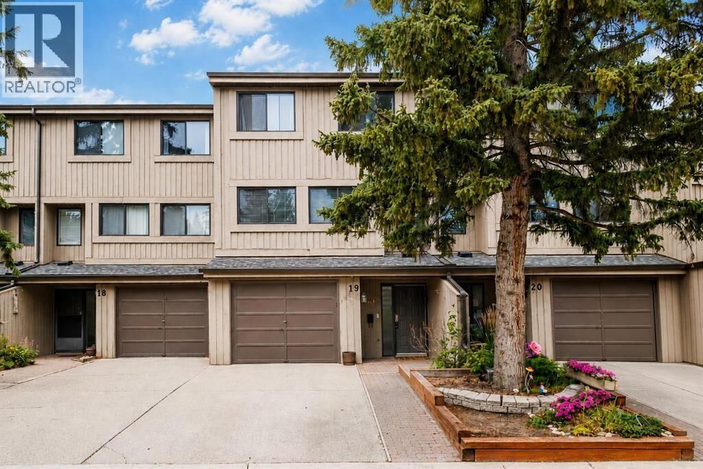 Property Photo: 10401 19 Street Southwest AB T2W 3E7