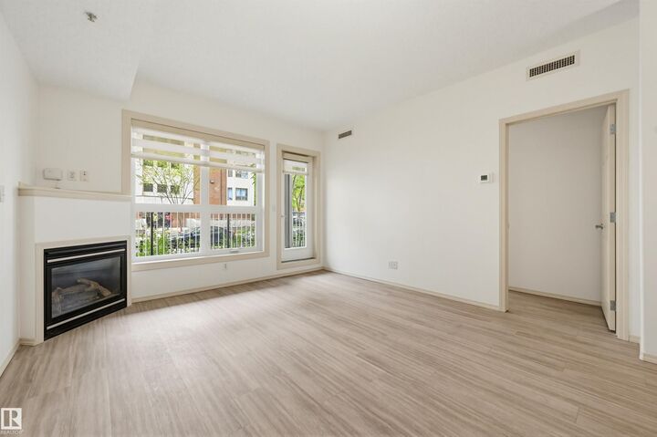 Property Photo: 11103 84 Avenue NW 102 AB T6G 2X4