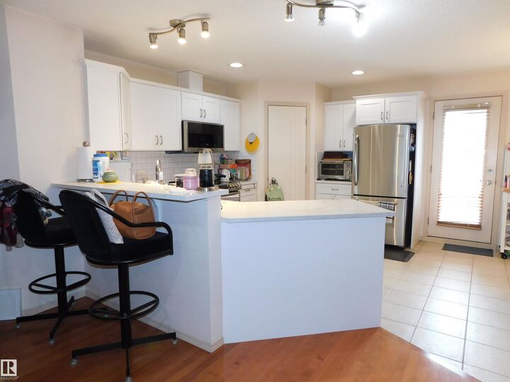 Property Photo:  303 Leger Way NW 9  AB T6R 2X9 