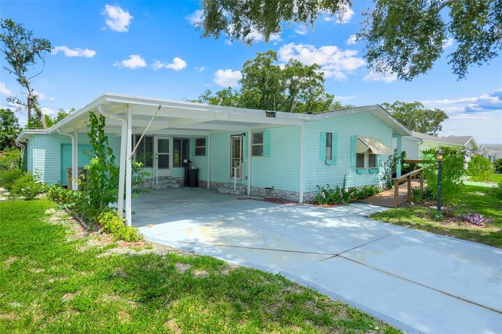 Property Photo: 5047 El Destino Drive FL 34748