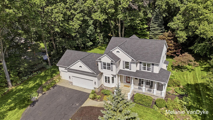 Property Photo: 5133 Brownstone Drive NE MI 49341