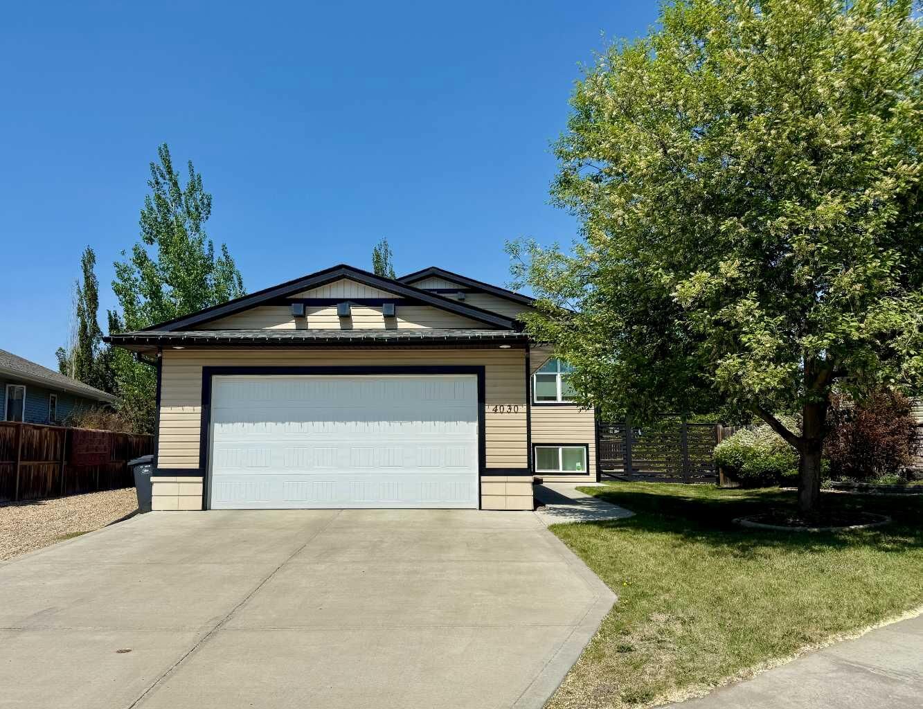 Property Photo: 4030 40 Street Close AB T4J 0A7