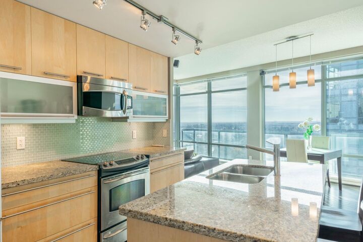 Photo de la propriété: 215 13 Avenue SW 2505 AB T2R 0V6