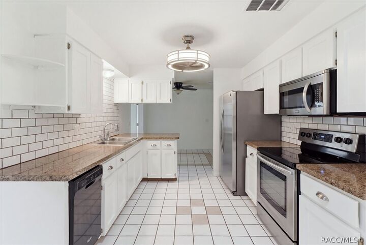 Property Photo:  518 S Adams Street  FL 34465 