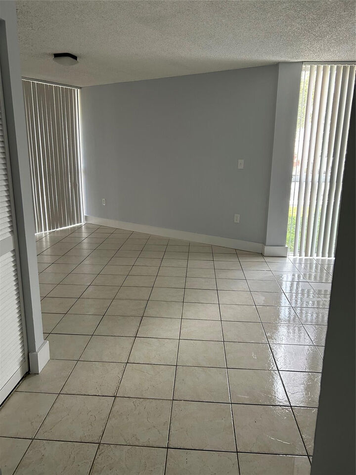 Property Photo:  7035 NW 186th Street D111  FL 33015 