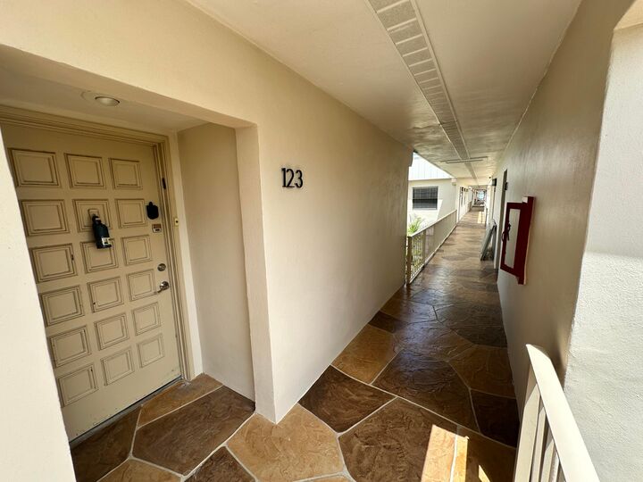 Property Photo:  123 Capri C  FL 33484 