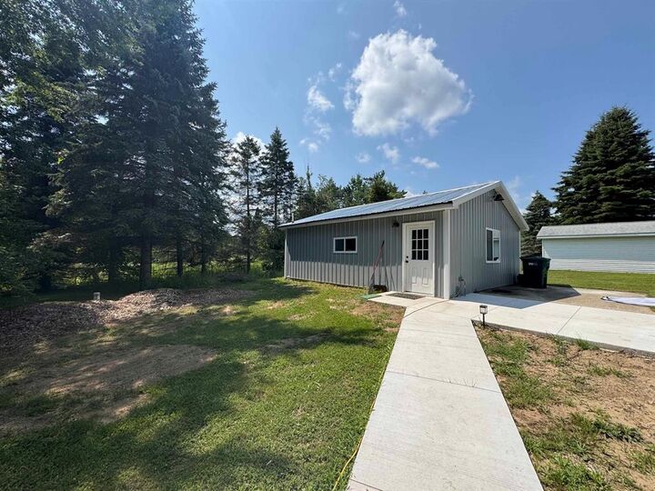 Property Photo:  978 E M-55  MI 48661 