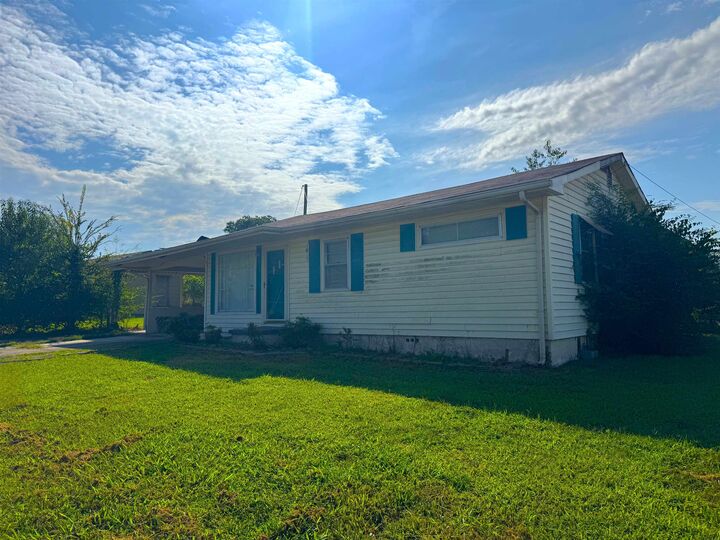 Property Photo:  301 Enterprise St  AL 35630 
