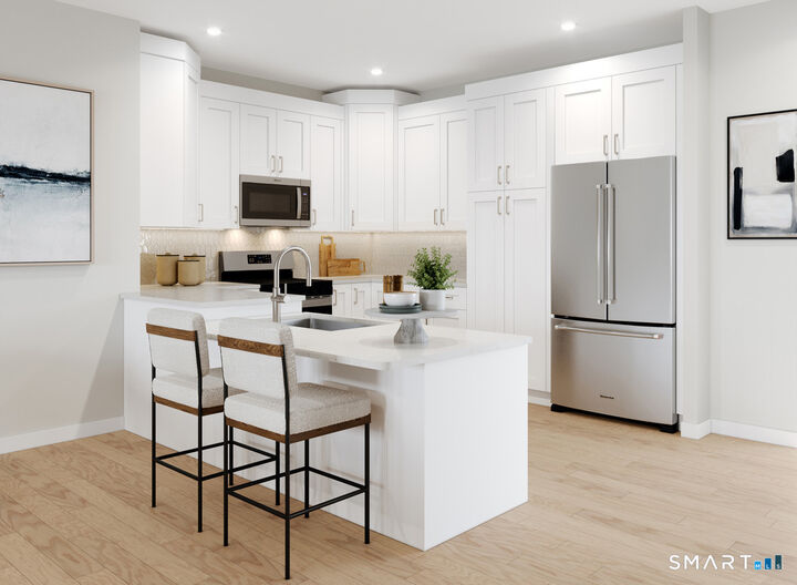 Property Photo: 105 Woodland Road 1005 CT 06810