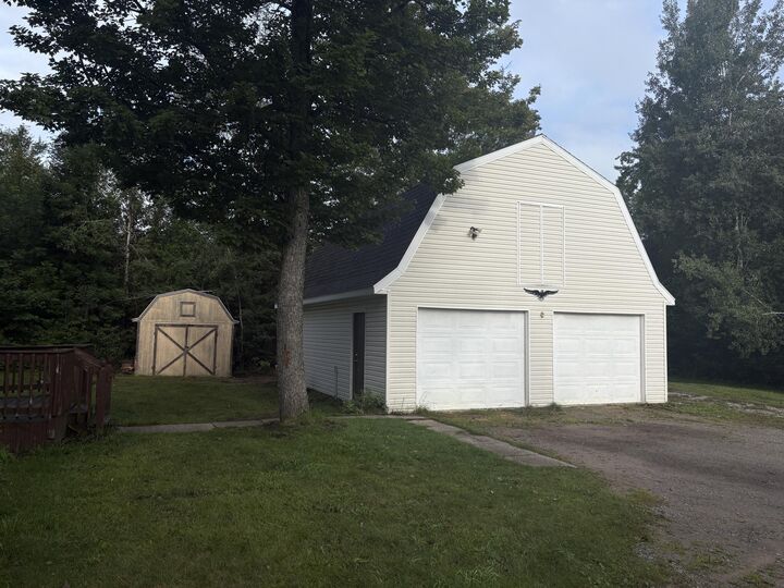 Property Photo:  122 Crockett Road  MI 49707 