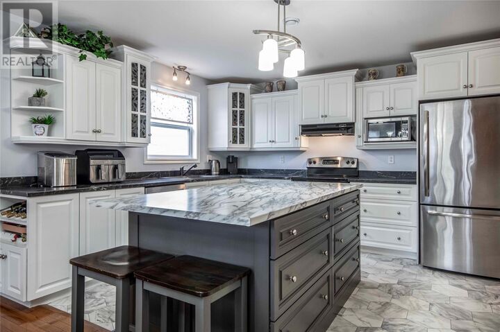 Property Photo:  401 St. Thomas Line  NL A1L 3R1 