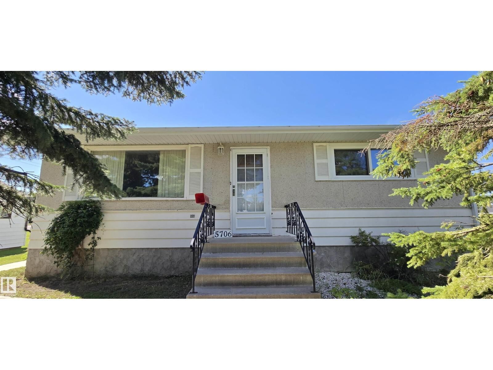 Property Photo: 5706 52 St AB T9C 1J2