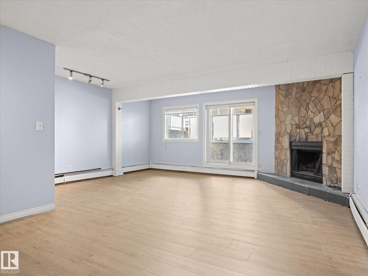 Property Photo:  10139 117 Street NW 110  AB T5K 2L3 