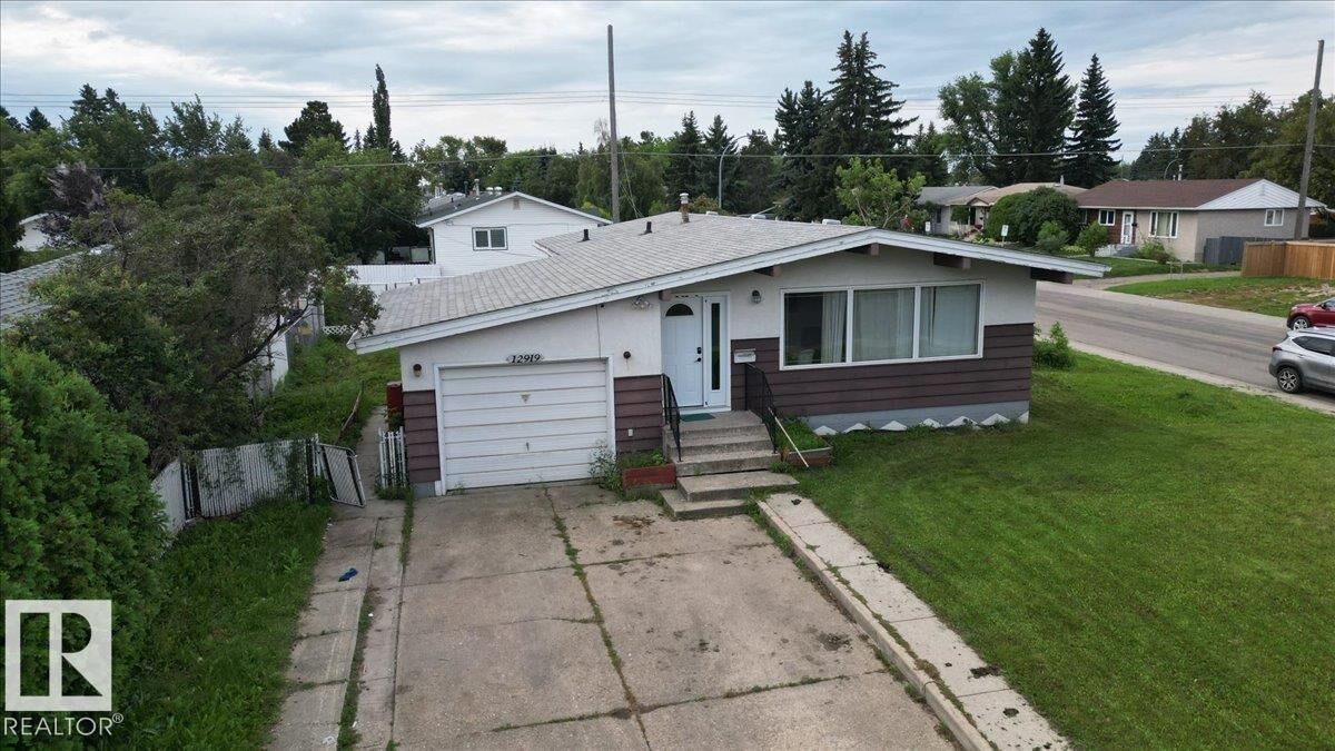 Property Photo:  12919 135 Avenue NW  AB T5L 3X7 
