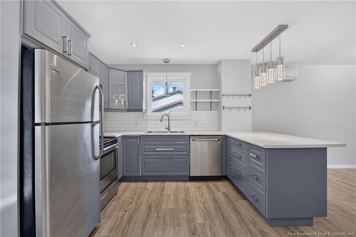 Property Photo: 880 Glengarry Place NB E3B 5Z9