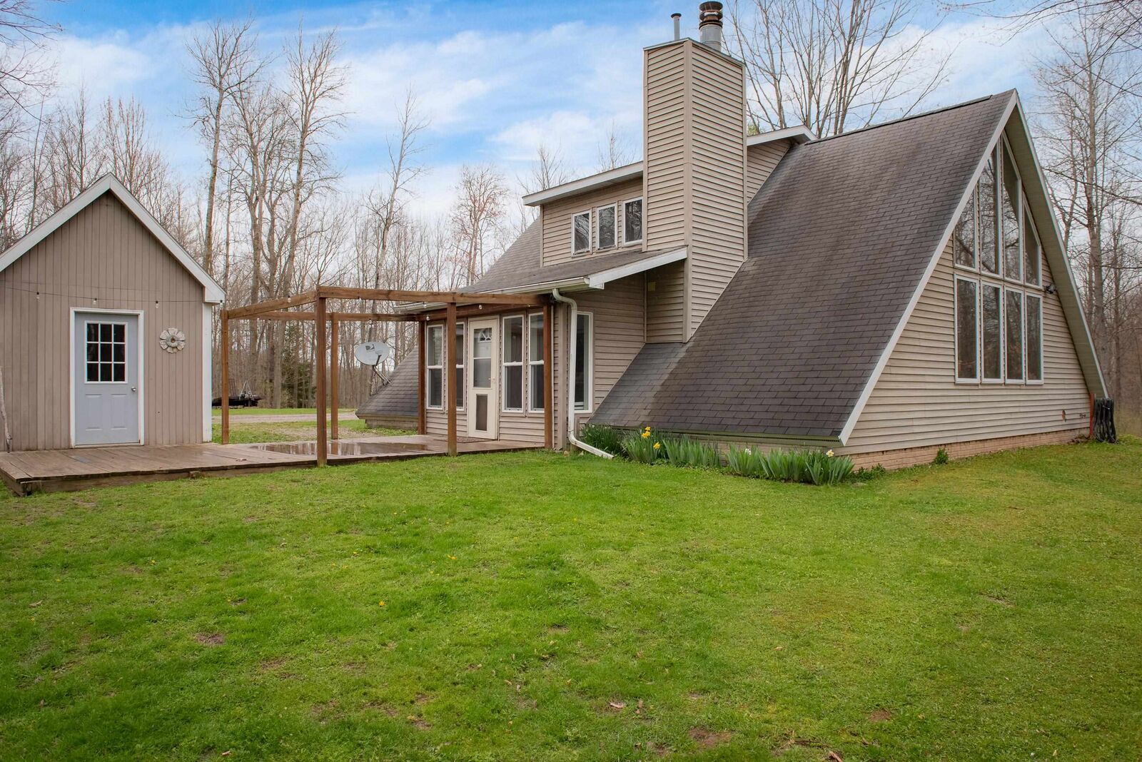 Property Photo:  1180 Winding Wood  MI 48622 