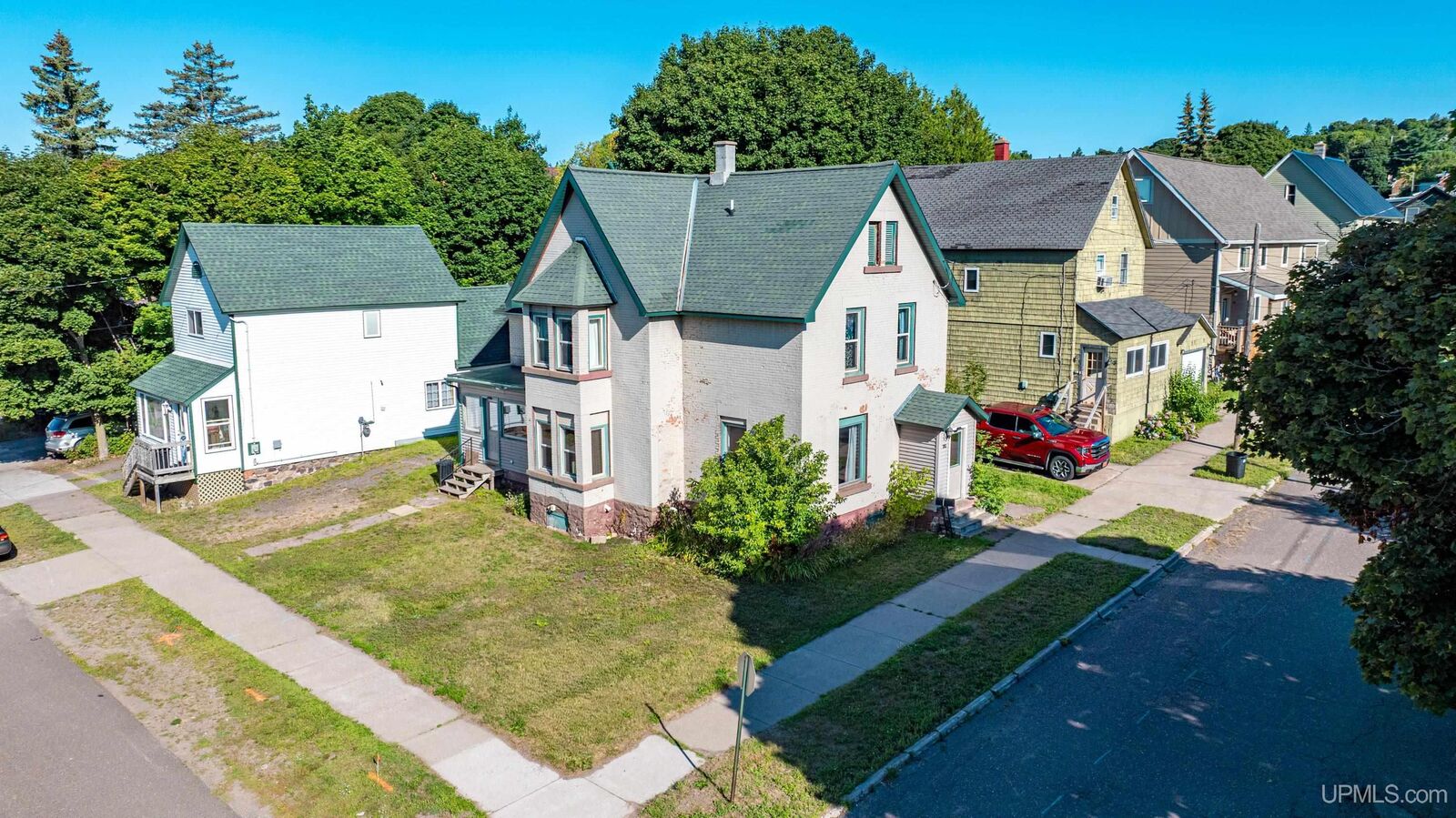 Property Photo:  202 Scallon Street  MI 49930 