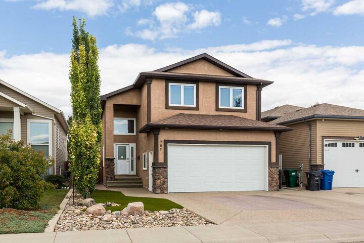 Property Photo: 709 Lynx Landing N AB T1H 0C3