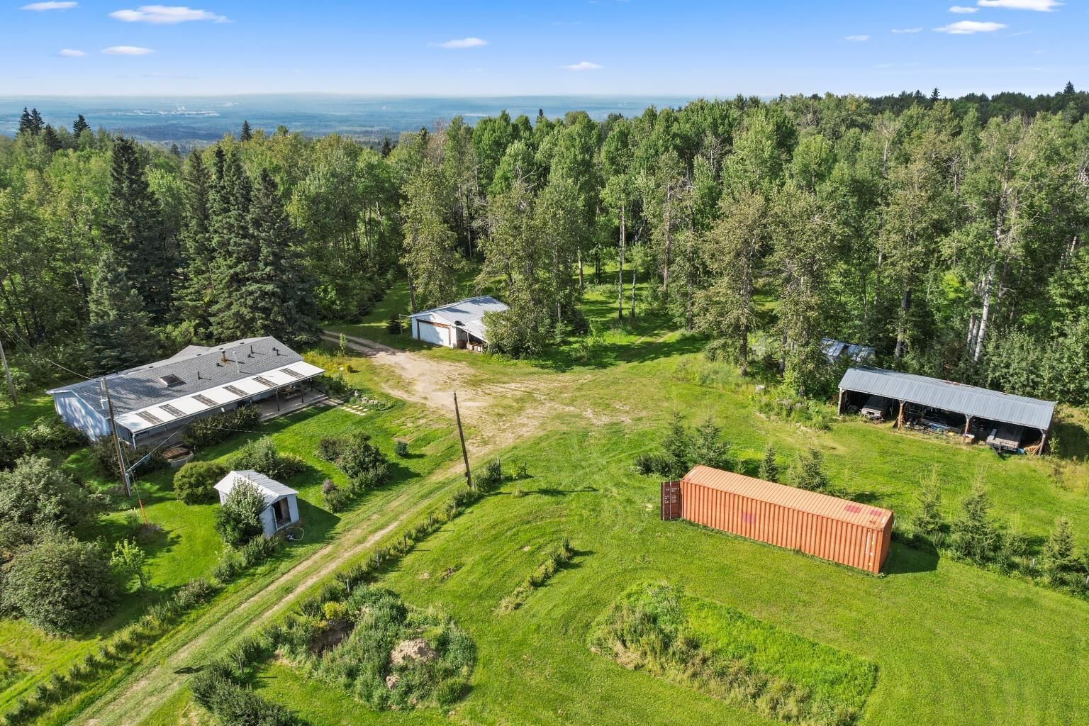 Property Photo: 590055A Range Road 110 AB T7S 1P3