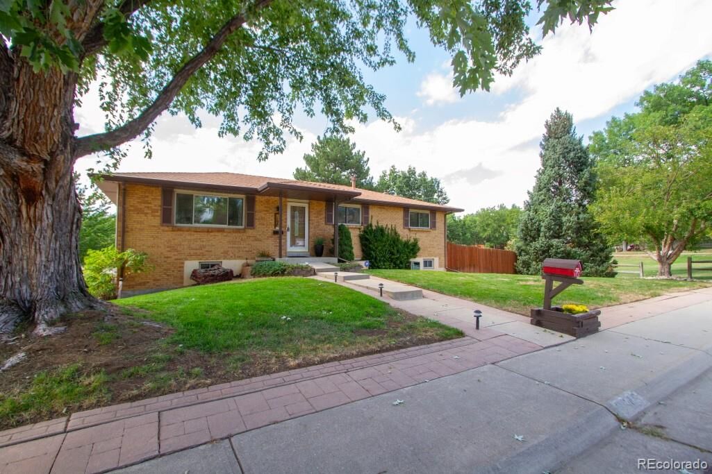 Property Photo:  6545 Dover Street  CO 80004 