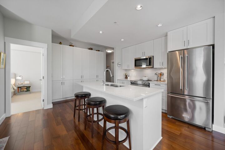 Property Photo: 1166 54A Street 312 BC V4M 4B5