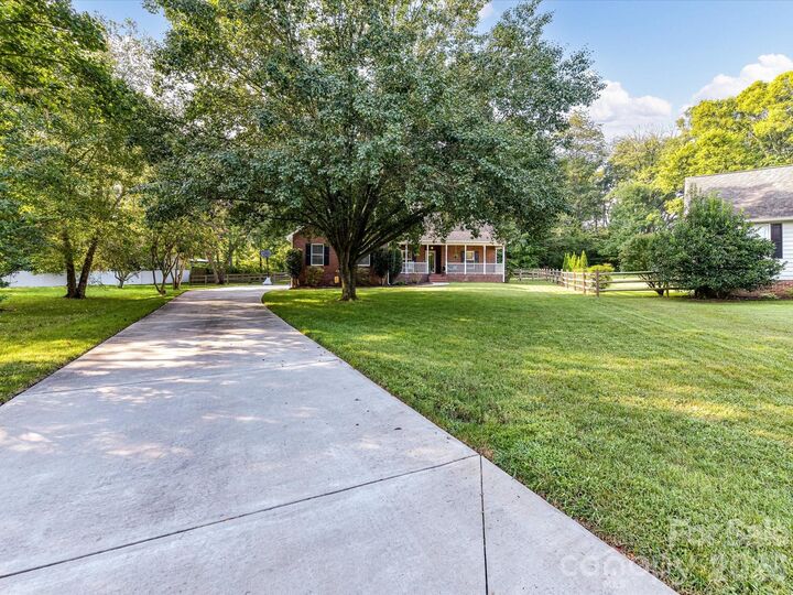 Property Photo:  8227 Laurel Oak Court  NC 28075 