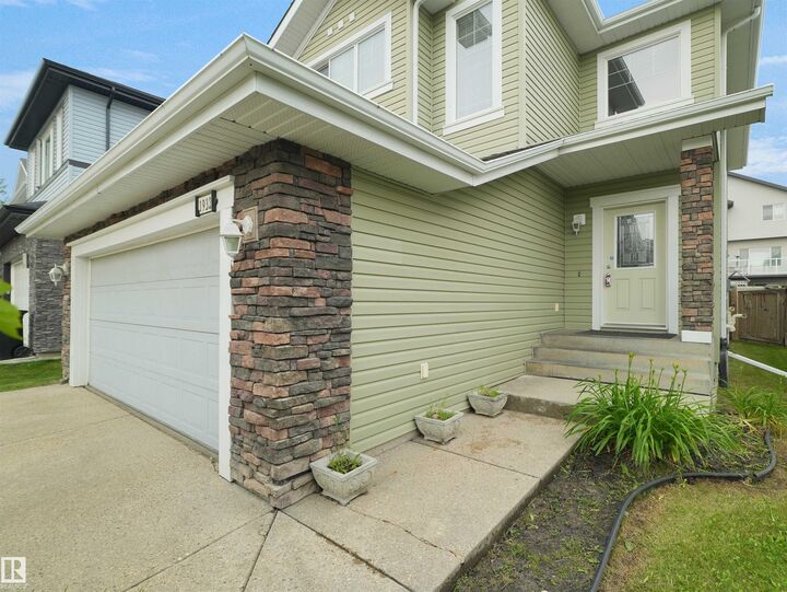 Property Photo:  1932 67 Street SW  AB T6X 0L9 
