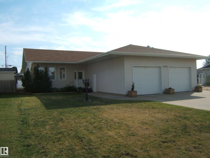 Property Photo:  4825 59 Avenue  AB T9C 1X3 