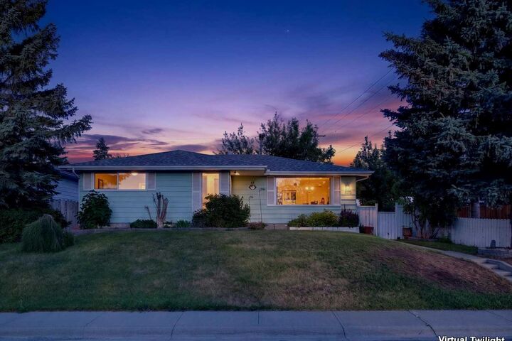 Property Photo: 7035 Huntercrest Road NW AB T2K 4J9