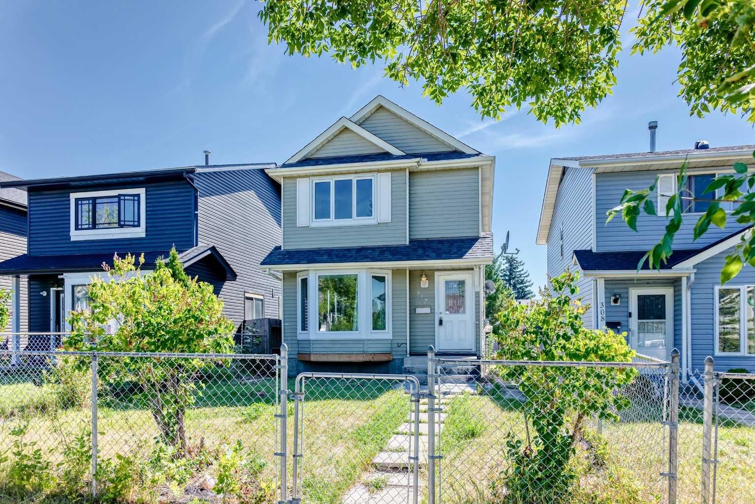 Property Photo: 312 Falton Drive NE AB T3J 2X1