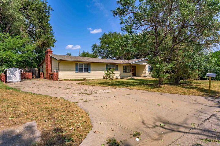 Property Photo: 220 E 44th St S KS 67216-1714
