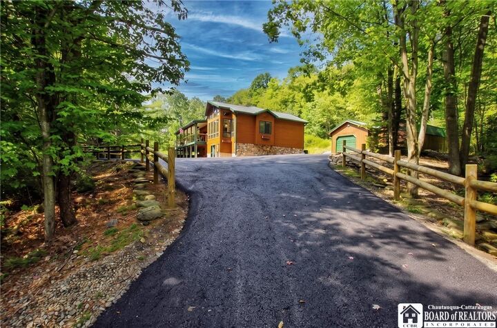 Property Photo:  12990 Guernsey Hollow Road  NY 14738 