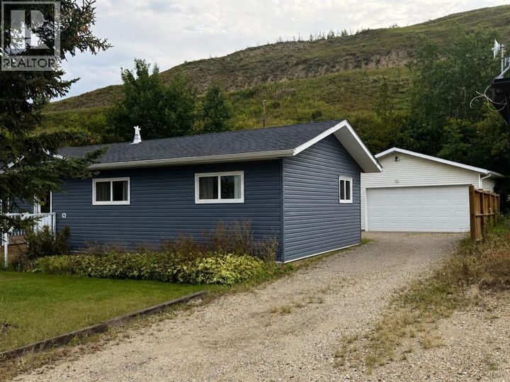 Property Photo:  10337 110 Avenue  AB T8S 1K5 