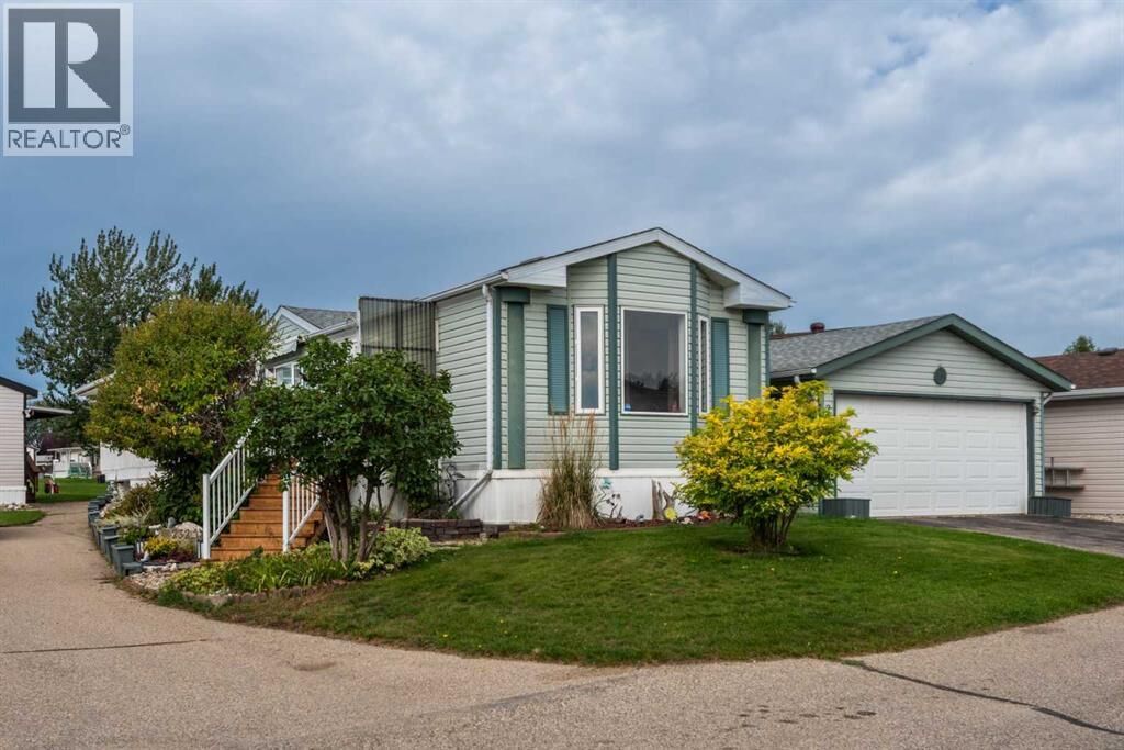 Property Photo: 232 Ranchwood Lane AB T1P 1M8