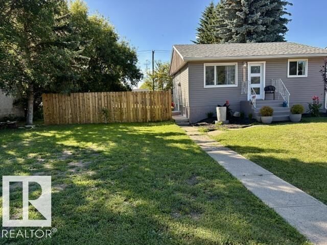 Property Photo:  5614 50 Street  AB T9C 1K3 