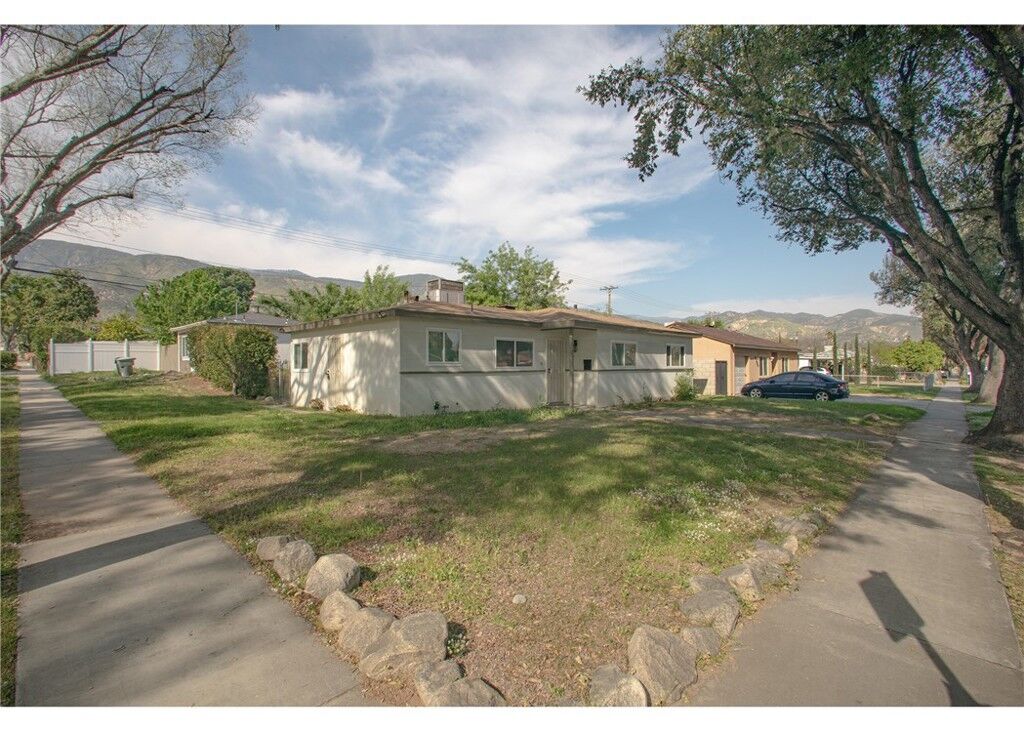 Property Photo:  496 W 48th  CA 92407 