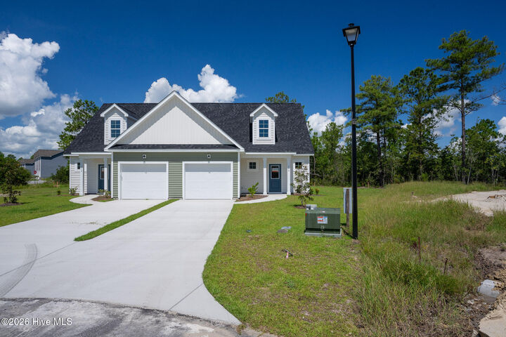 Property Photo:  308 Coastal Reef Court  NC 28445 