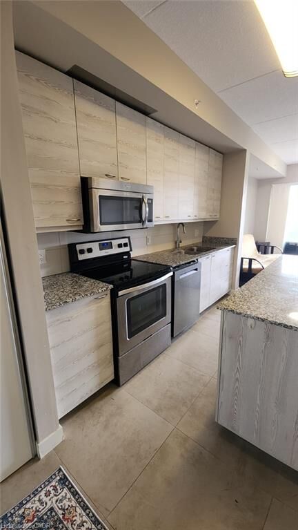 Property Photo:  280 Lester Street 418  ON N2L 3W5 
