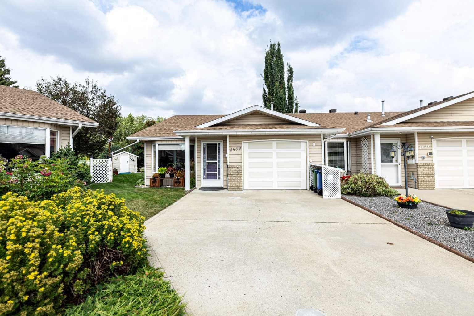 Property Photo:  4634 42 Street Crescent  AB T4N 6Y6 