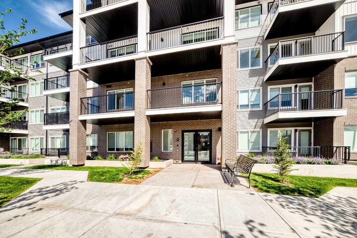 Property Photo:  6 Merganser Drive West 1406  AB T1X 2Y2 
