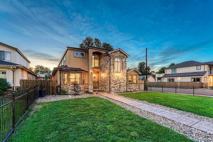 Property Photo:  1023 S Locust Street  CO 80224 
