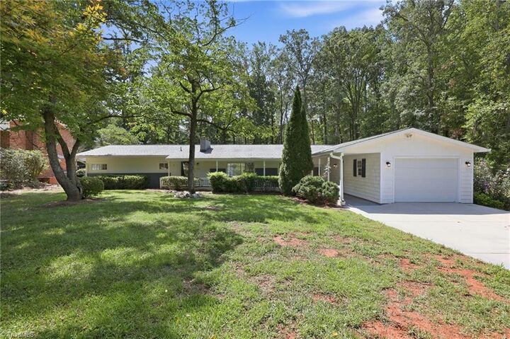 Property Photo:  204 Pineburr Road  NC 27455 
