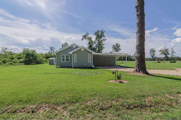Property Photo:  15687 Penalber Rd  LA 70449 